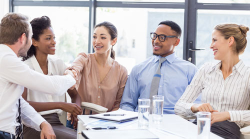 Office colleagues smiling