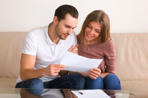 Couple discussing insurance.