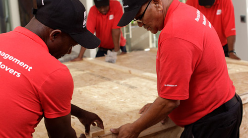 Men packing a crate